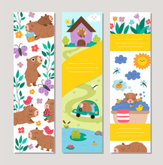 Fototapeta premium Cute capybara bookmarks set with funny relaxing animal. Vector cartoon capibara vertical cards collection with bath, fruit, reeds, insects. Fantasy forest book mark print templates pack