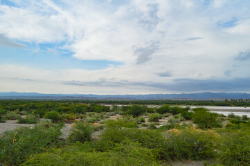 Fototapeta premium view of the river and clouds environment