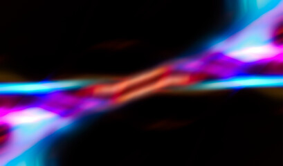 Colorful glow sparks of light texture. Orange red rays on dark blue abstract layer black background .Crystal flare abstract effect. Holographic sunlight reflection wallpaper, colorful glare bokeh.	