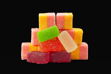 Multicolored marmalade. Jelly sweets isolated on black. Sweets for all