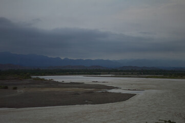 Turbat city Baluchistan lake landscape. storm clouds over the river