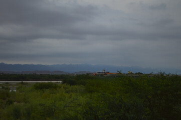 storm clouds over the river landscape