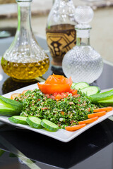 A Medley of Freshness: Tabbouleh Salad with Vibrant Vegetables, Dressed with Golden Olive Oil, A Culinary Still Life in Glass and Glazed Elegance