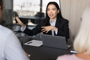 Young Asian businesslady conduct meeting with shareholders, provide explanations, share solutions,...