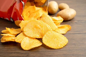 Potato chips , delicious BBQ seasoning spicy for crips, thin slice deep fried snack fast food.