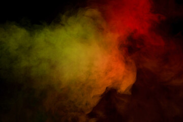 Fototapeta premium Red and green steam on a black background.