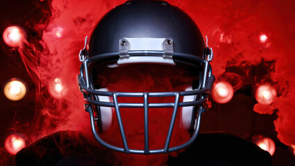 American football helmet emerging from red smoke and spotlights