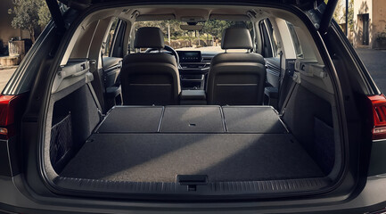 Spacious trunk of modern car showing interior and folded seats