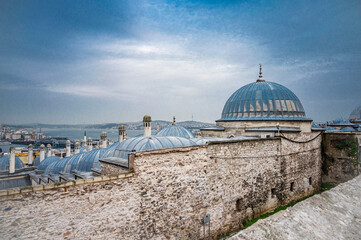 Sulaimanya mosque: Majestic domes of Istanbul&rsquo;s historic skyline overlooking the Bosphorus under a moody sky showcasing centuries-old Ottoman architecture and the timeless beauty of Turkey&rsquo;s culture 