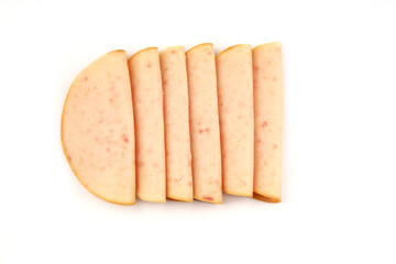 sliced cold smoked turkey breast isolated on white background. top view