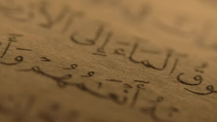 20 March 2025 - Abu Dhabi, UAE.Old Calligraphy Scriptures,Muslim Holy Book Quran