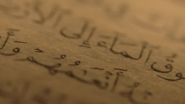 20 March 2025 - Abu Dhabi, UAE.Old Calligraphy Scriptures,Muslim Holy Book Quran