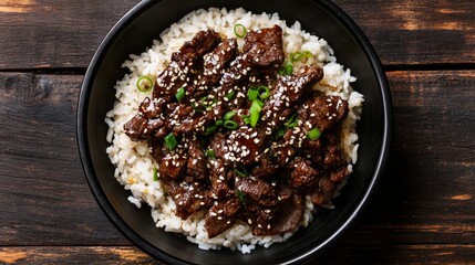Grilled Korean Beef Dish with Sesame Seeds and Spring Onions on Rice