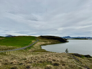 panoramic picture of a large pseudo crater at Lake Myvatn in Skutustadir, iceland on an overcast day