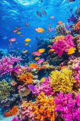 Obraz premium Vibrant underwater scene teeming with colorful fish swimming among a thriving coral reef ecosystem in clear blue ocean water