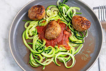 zucchini noodles with pasta sauce and meat balls