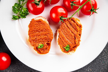 Pepper pate red pepper dip roasted vegetable hummus appetizer vegetables dish fresh gourmet food background on table rustic food top view copy space keto and paleo diet vegetarian and vegan food