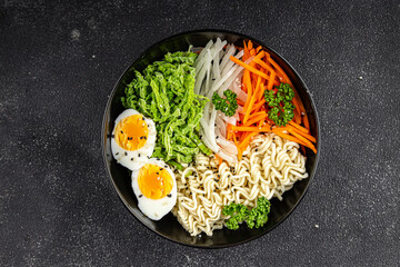 budda bowl noodles vegetables salad tasty fresh delicious gourmet food background table rustic food top view copy space keto and paleo diet vegetarian and vegan food