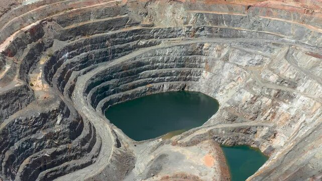 View inside the mine, Water in the earth hole of old Gold Mine, Aerial View Video, Goldfields, Western Australia, Australia