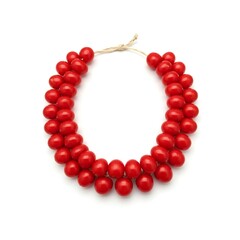 Red beaded necklace on white background representing handmade jewelry