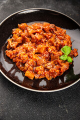 Eggplant stew dish vegetables salad tasty fresh delicious gourmet food background on table rustic food top view copy space keto and paleo diet vegetarian and vegan food