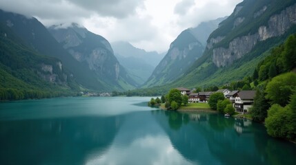 Fototapeta premium A high-quality photo of Lake Thun in Switzerland during midday, rainy weather, captured from above, showing the rain-soaked landscape and rippling water.