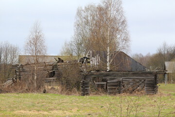 abandoned uninhabited houses in old villages from the times of collective farms and...