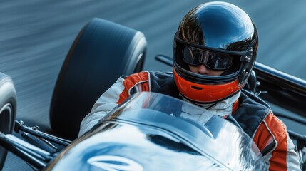 Intense focus of a race car driver in a vintage black helmet during a high speed race on a sunny day reflecting on the car body