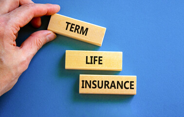 Term life insurance symbol. Concept words Term life insurance on beautiful wooden blocks. Beautiful...