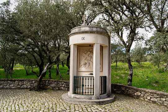 Chapel in a lush surrounding at Fatima, Portugal captured in the sunlight. Stations of the Cross, Nineth Station.