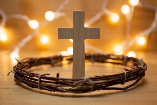 croix chrétienne et couronne de branchages avec lumière divine - Powered by Adobe