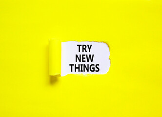 Try new things symbol. Concept words Try new things on beautiful white paper. Beautiful yellow paper background. Business motivational lifestyle try new things concept. Copy space.