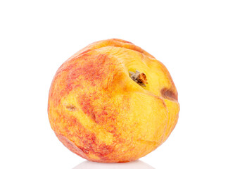 One rotten peach isolated on white background, macro.