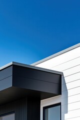 Modern architectural design featuring minimalist black and white building facade.