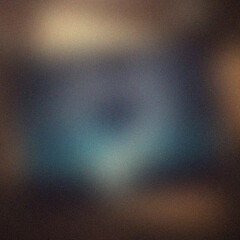 Abstract blurred background with dark tones and color gradients