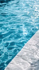 Detail of a refreshing modern pool on a sunny day with crystal clear water