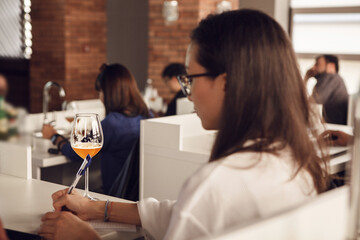 Female Sommelier on Beer Tasting Courses. Woman Participant is Training Dedicated to Making Beer and Brewing.