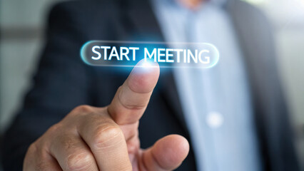 Finger tapping on holographic button to start meeting, showcasing modern technology and virtual interaction