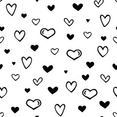 Vector seamless pattern with hand drawn hearts. Cute simple design for fabric, wrapping, wallpaper for Valentine's Day.