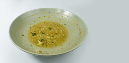 Dirty food waste in a plate on white background