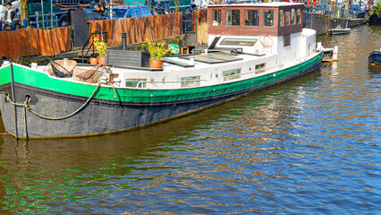 Fototapeta premium Amsterdam canals in Netherlands colors and lights