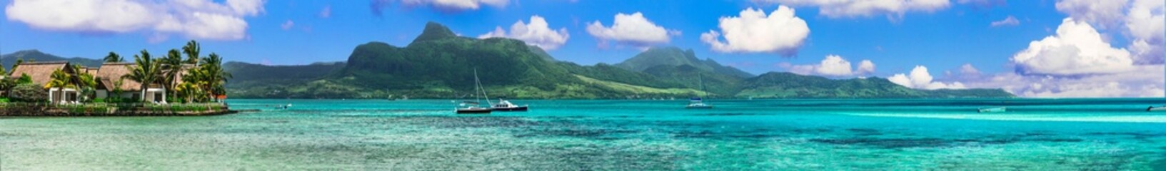 Amazing tropical island scenery. Beautiful Mauritius exotic island. View of Lion mountains in south near Mahebourg , panoramic view with luxury resort