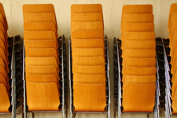 Stacked order, neatly arranged chairs in symmetry