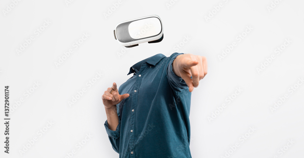 Aufkleber An individual engages with advanced virtual reality technology, wearing a headset that obscures their identity. The person points forward, emphasizing interaction and immersion in digital experiences.
