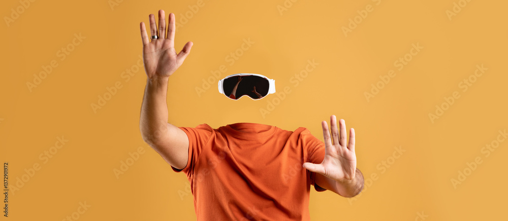 Fototapete A user enthusiastically engages with virtual reality technology while wearing goggles, showcasing a dynamic and modern approach to immersive experiences. The background is a vibrant yellow.