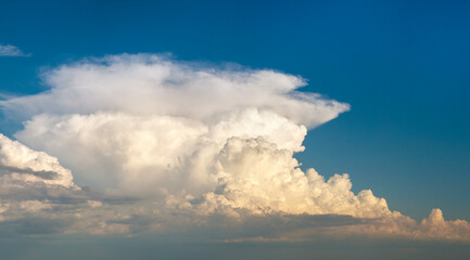 Florida weather. Blue sky with white summer rain clouds. Colorful summer landscape