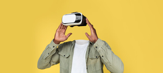 A person interacts with virtual reality equipment, showcasing advanced technology.