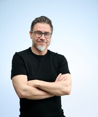 Happy older good looking casual man at home, smiling. Portrait of mid adult, mature age man in glasses, Isolated on white.