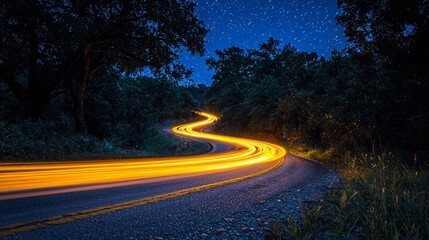 A long exposure shot of a winding road at night
