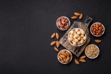 Raw peeled macadamia nut in ceramic bowl